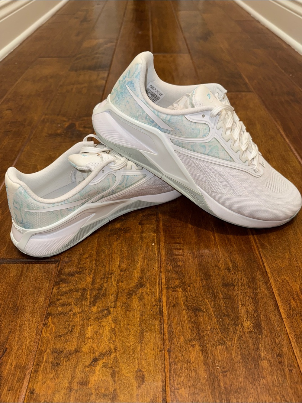 Reebok Women's White Sneakers with Pale Blue Accents